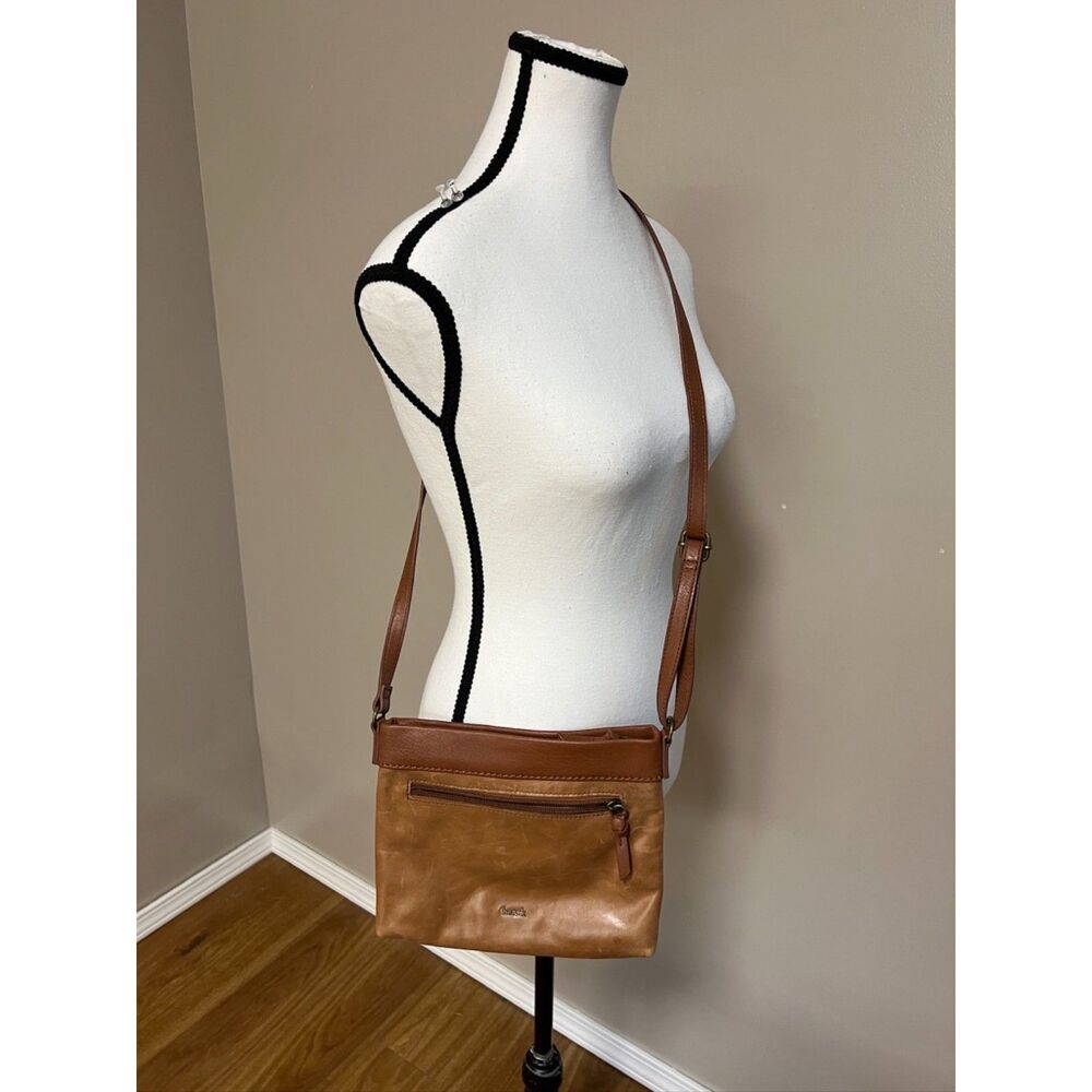 The Sak matte floral embossed tan leather Sanibel crossbody bag
